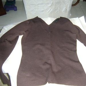 a V neck sweater in perfect condition